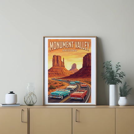 Vintage cars drive on a road through Monument Valley, Arizona.