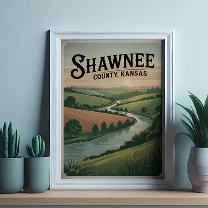 Framed artwork featuring a landscape of Shawnee County, Kansas with rolling hills and river.