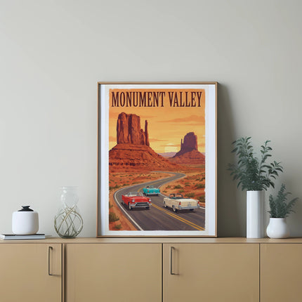 Poster with "Monument Valley" text above a desert landscape with cars on a road.