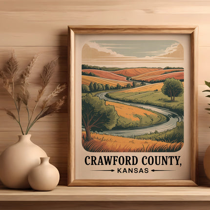 Framed artwork of rolling Kansas hills with a winding road, titled "Crawford County, Kansas".