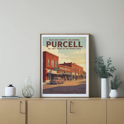 Vintage style poster of Purcell, Oklahoma, featuring brick buildings and a classic car.