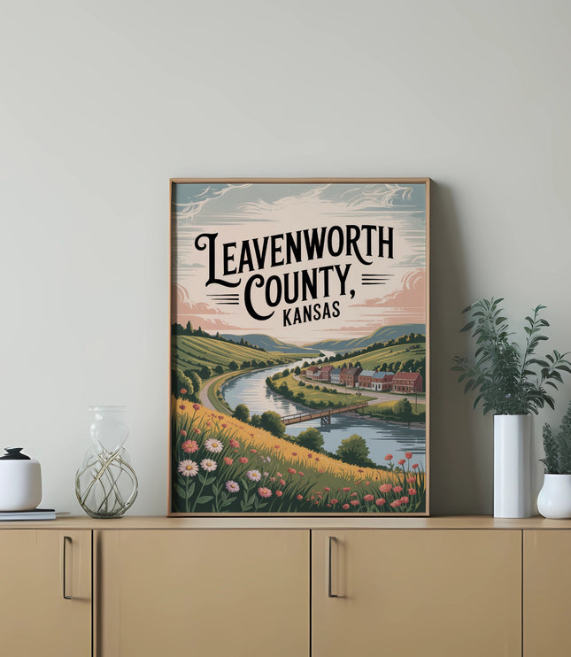 Leavenworth, Kansas landscape artwork with river, town, and wildflowers.