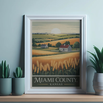 Framed print of a golden wheat field, houses, and hills with "Miami County, Kansas" text.
