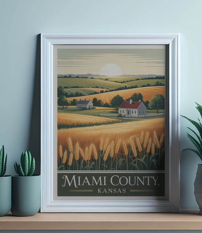 Framed print of a golden wheat field, houses, and hills with "Miami County, Kansas" text.