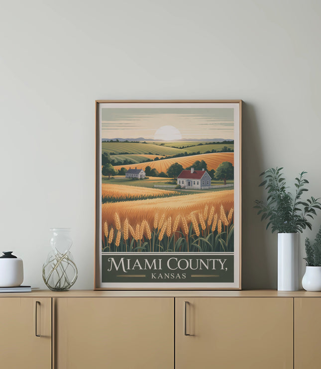 Framed landscape art of Miami County, Kansas with fields of wheat and houses.