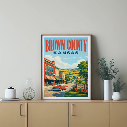Brown County Kansas vintage travel poster with red car and rolling hills.