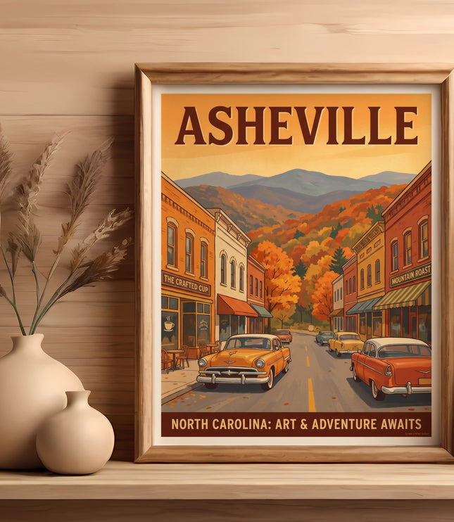 Framed Asheville poster depicting vintage cars on a main street with fall foliage.