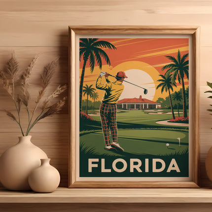 Framed poster of a golfer swinging at a Florida golf course at sunset.