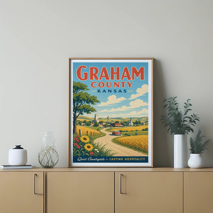 Graham County, Kansas vintage travel poster with a winding road and sunflowers.