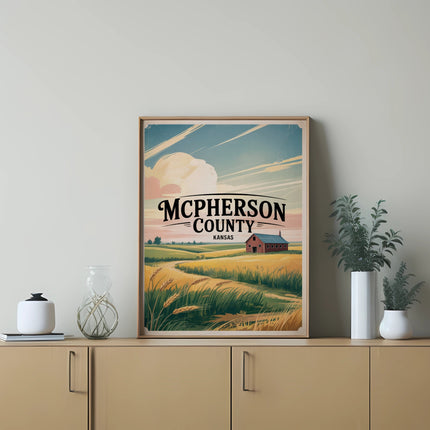 Vintage style poster of McPherson County Kansas landscape with barn and wheat field.