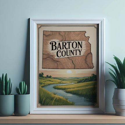 Framed map of Barton County, Kansas, with a river and sunset in the background.