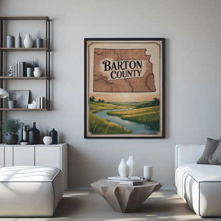 Framed vintage Barton County Kansas map poster hanging on wall between white sofas.
