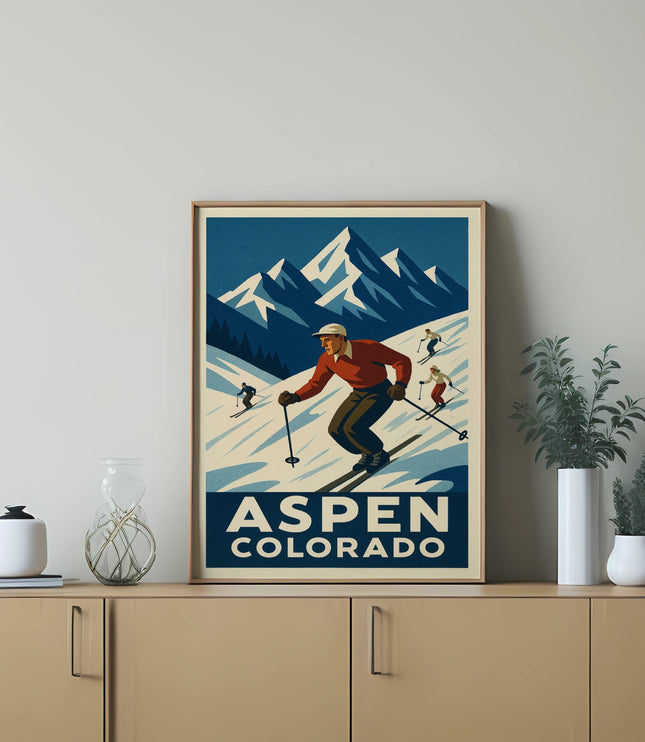 Vintage ski poster for Aspen Colorado showing skiers on a mountain.