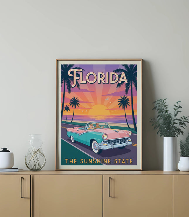 Retro Florida travel poster with a convertible driving by a sunset and palm trees.