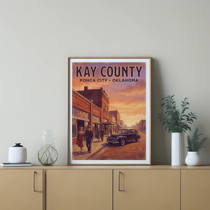Poster of Kay County, Ponca City, Oklahoma, with vintage street scene and car.