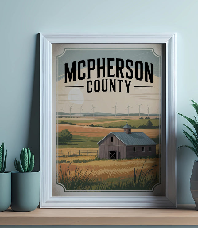 Framed poster of McPherson County with barn and windmills, displayed on a shelf.