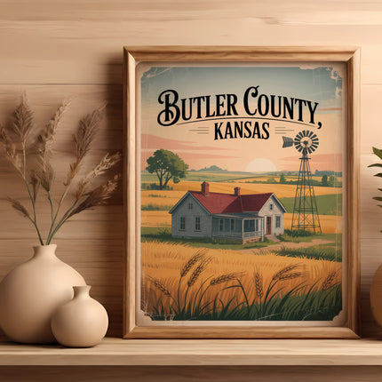 Framed illustration of a farmhouse with a windmill in a golden field, "Butler County, Kansas" text.