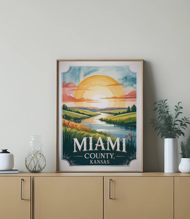 Framed vintage travel poster for Miami County, Kansas featuring a sunset over a river.