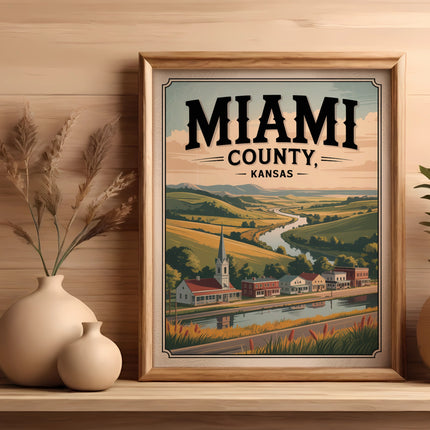 Framed artwork of Miami County, Kansas, featuring rolling hills and a village.