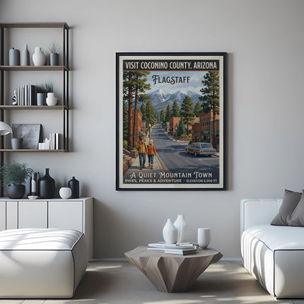 Framed Flagstaff, Arizona travel poster depicting a quiet mountain town with snow-capped peaks.