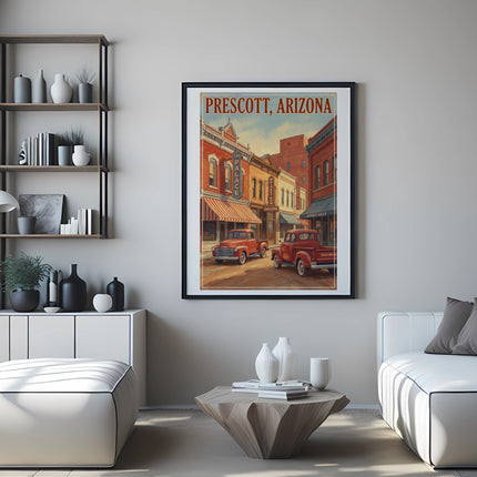 Framed artwork of Prescott, Arizona street scene with red trucks and historic buildings.