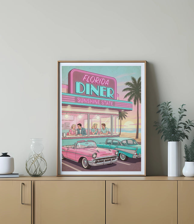 Retro diner sign and cars, framed art on wall above console table.