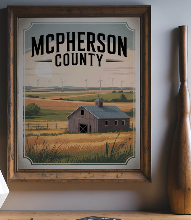 Framed poster with "McPherson County" text above rural scene with barn and wind turbines.