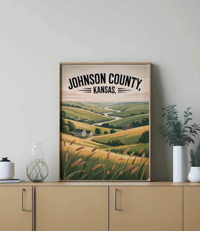 Framed artwork depicting rolling hills of golden wheat fields and a distant farmhouse in Johnson County, Kansas.
