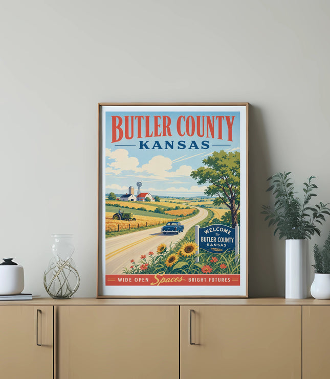 Butler County, Kansas poster with farm, sunflowers, and text "WIDE OPEN SPACES. BRIGHT HORIZONS."