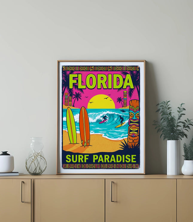 Florida surf paradise poster with surfers, palm trees, tikis, and surfboards on a beach.